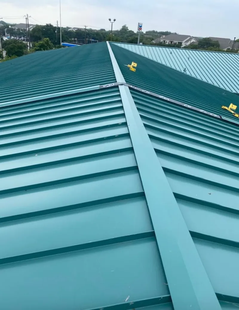 Green commercial metal roof ridge and valley for Metal Roof Repair in University of Virginia
